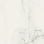 Caesarstone Porcelain 501 Snowdrift White surface with subtle gray veins running through it.